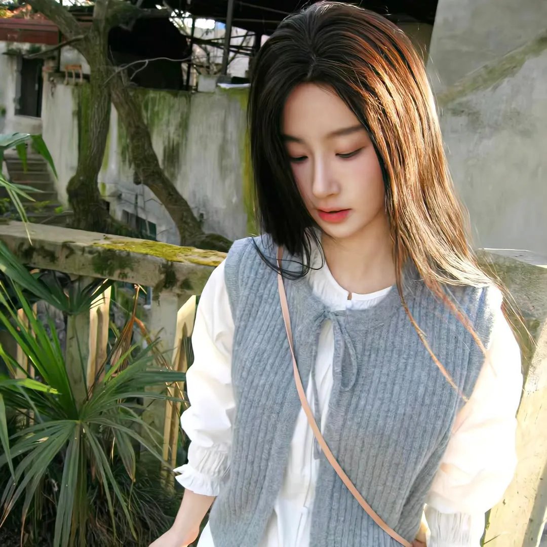 她的城